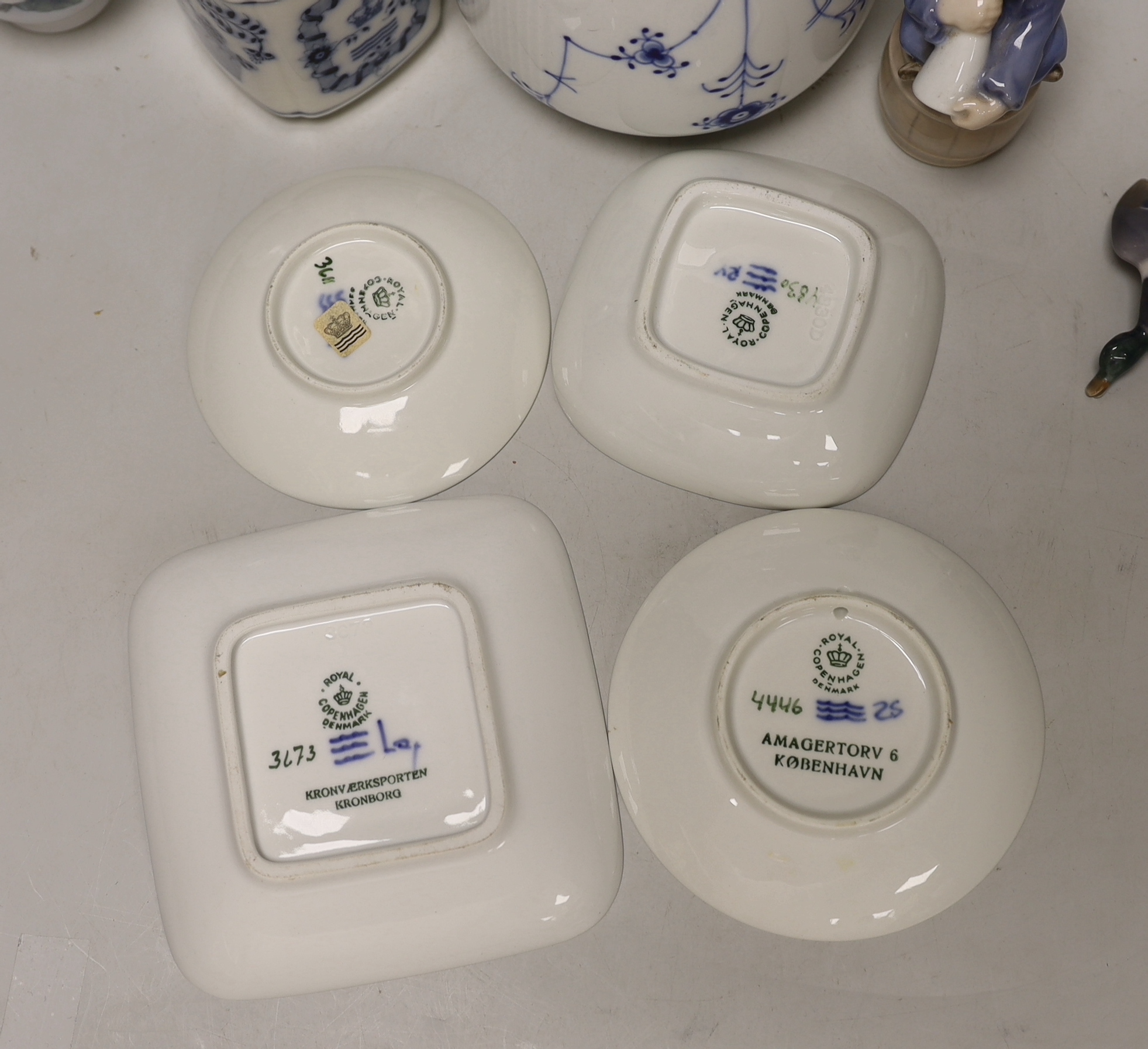A group of Royal Copenhagen porcelain including an onion pattern teapot
